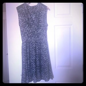 Black and white patterned faux-wrap dress